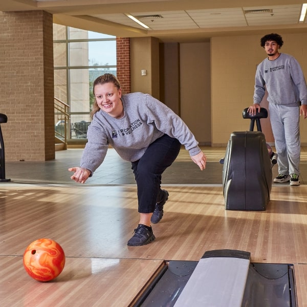 Two Students Bowling at the Macon-Rec-and-Wellness Center.jpg