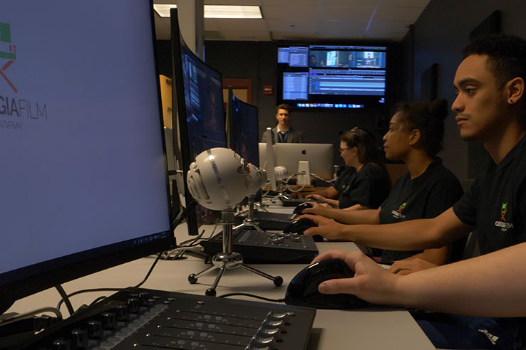 A group of students working at computers