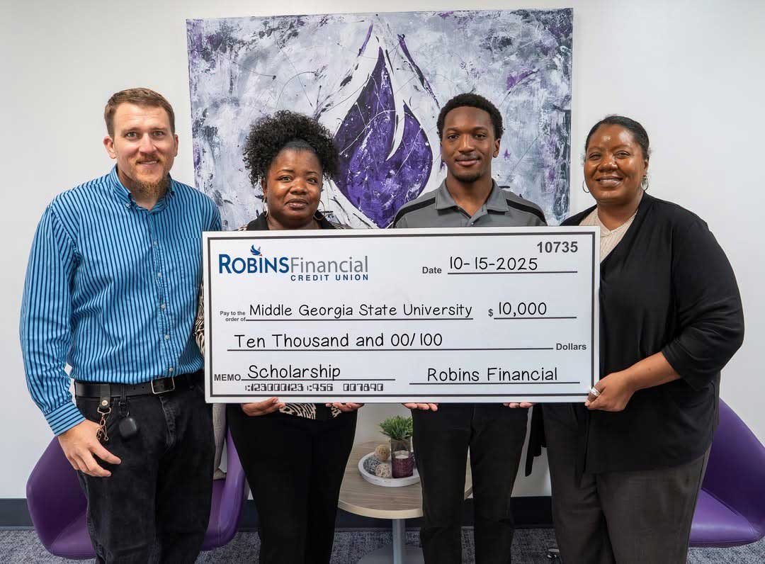 From Left to Right: Justin Barnhart (Student), Jennifer Bryant (Robins Financial Credit Union), Adrian Perry (Student), and Keisha Fields (MGA Donor Relations Manager).