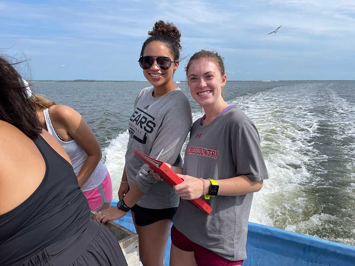 biology students on a boat