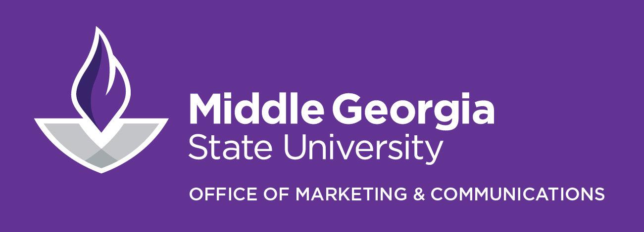 An institutional logo of Middle Georgia State University with a dark purple background, the flame logo on the left and the university name on the right side of it.