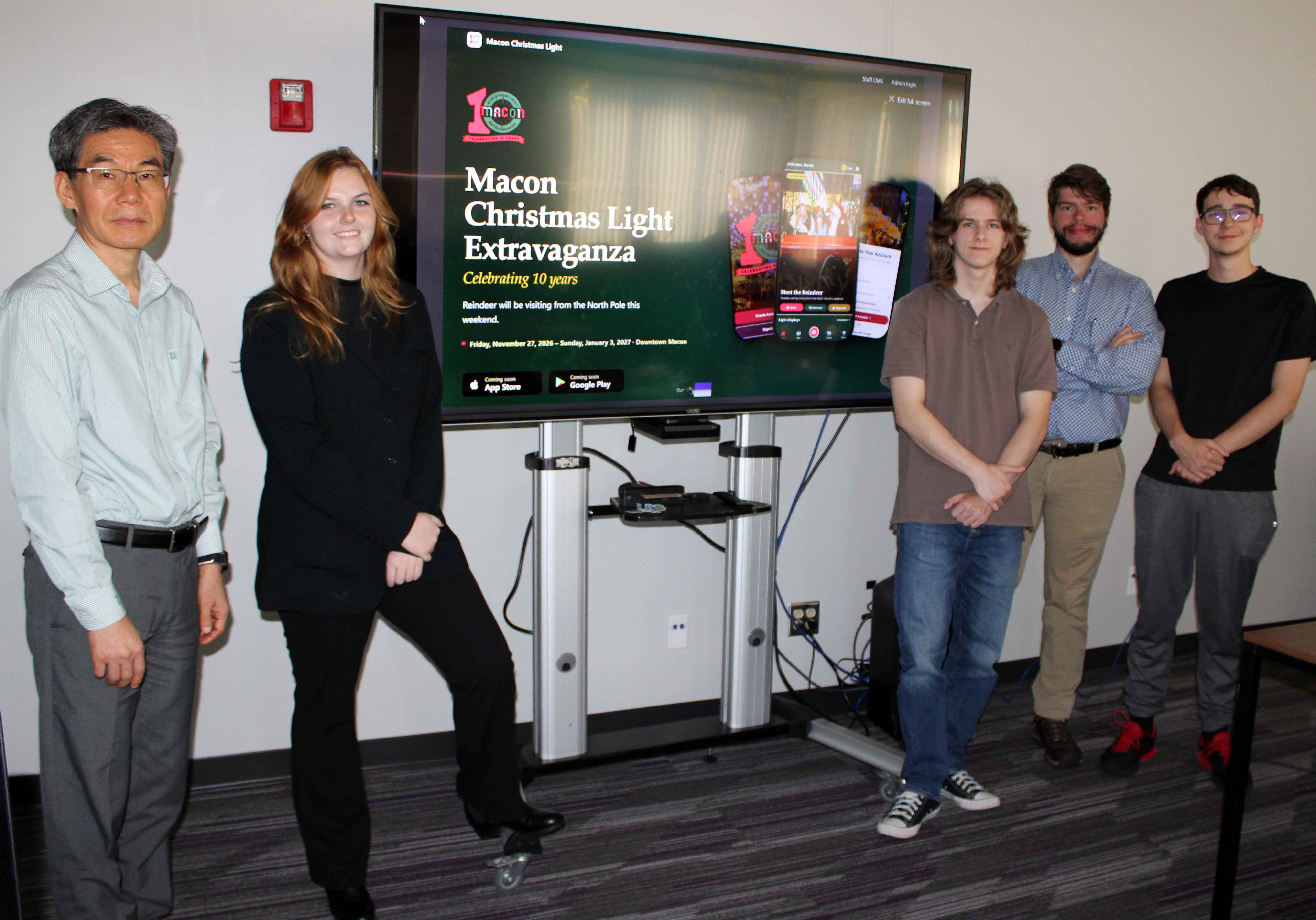 L-R Dr. Myungjae Kwak and some of the computer science majors working on the Macon Christmas Light Extravaganza app - Alaina Brown, Peyton Colabine, David Senseney, and A.J. Dreslinski. All are active members of the CompSci Knights student organization, which meets every week at the Warner Robins Campus