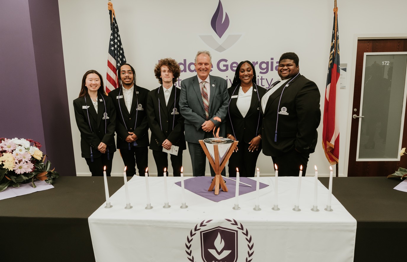  five Torch Society members graduating in 2026 with President Blake