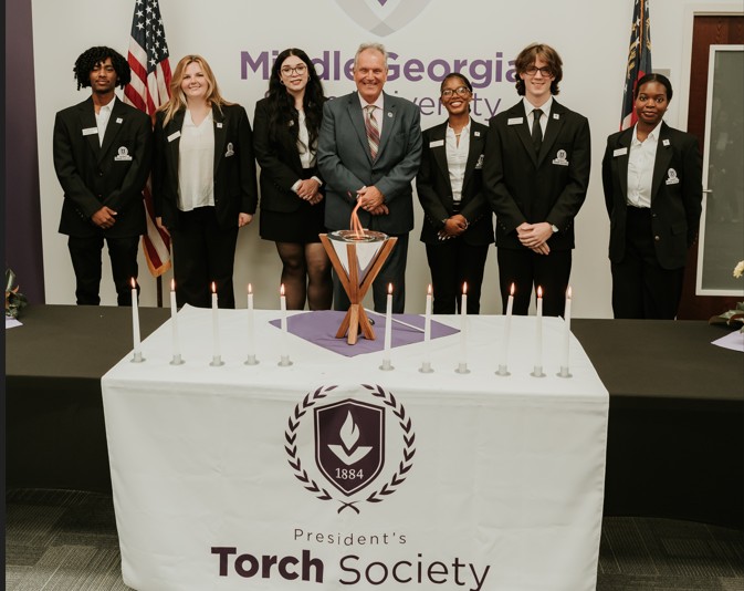 2026 Torch Society new members with President Blake