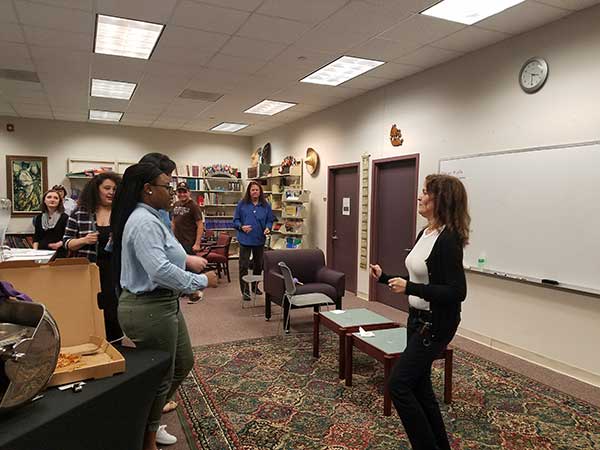 Students learning to Salsa Dance