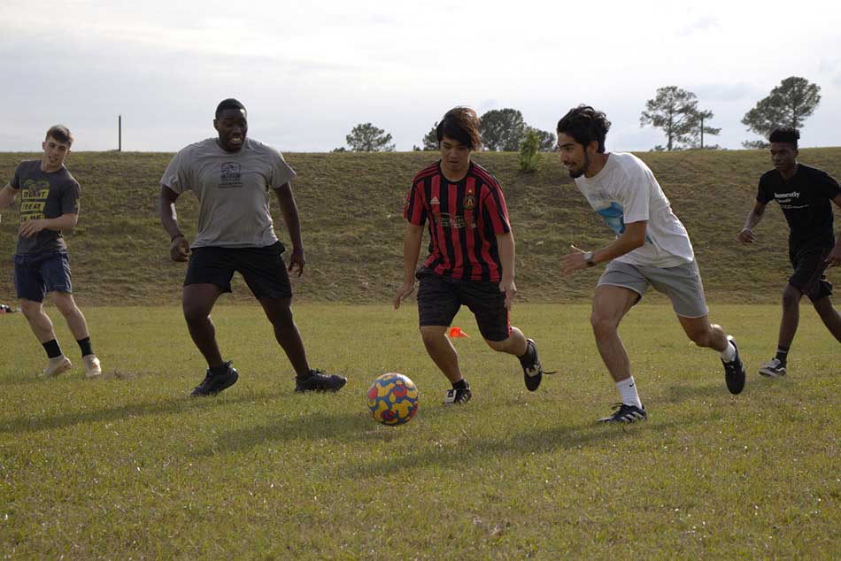 students playing soccer