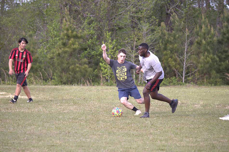 students playing soccer