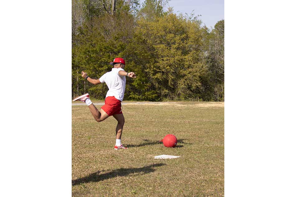 a student gets ready to kick a kickball